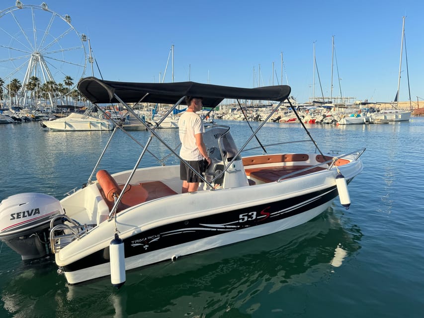 Benalmádena: Boat Rental without License - The cruise plan on the Costa del Sol: photo time, swimming, and sunset