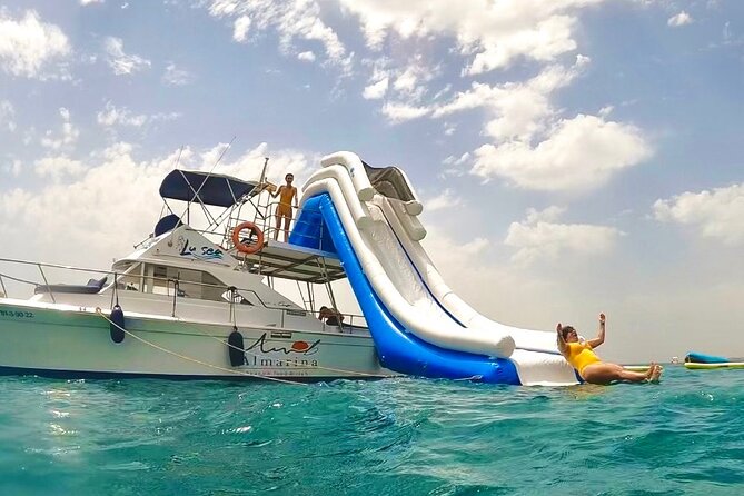 Boat Tour with Snorkeling, Water Slide, Lunch and Pick Up - Kayak or paddle surf: choose your pace on calmer water