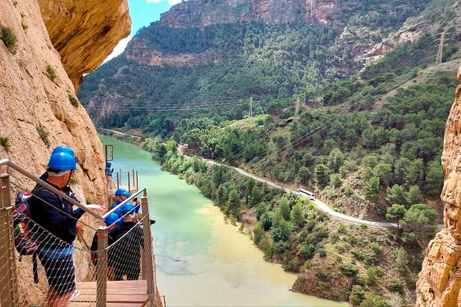 Caminito del Rey with Pickup from Malaga City - Entering Caminito: tunnel start, helmet safety, and first nerves