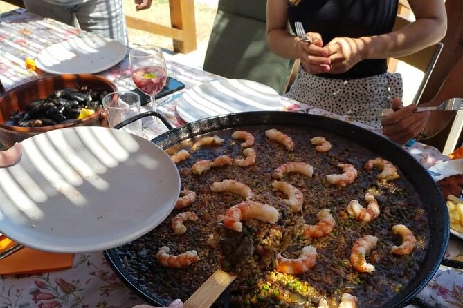 Chefcooking Paella from our Andalusian Grandmother at a Family Farm - Sangria welcome, plus the starter table that sets the pace