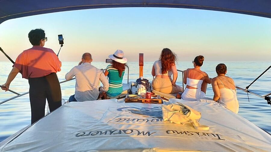 Estepona: Dolphin Search Boat Trip with Drink and Snacks - Kids on board: marine knots workshop, life jackets, and small moments that land
