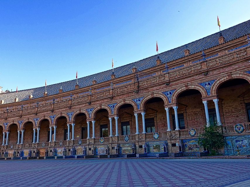 From Costa del Sol: Seville Day Trip - Maria Luisa Park and Plaza de España: The 1929 Expo Moment