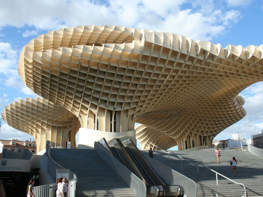 From Costa del Sol: Seville Day Trip - Guadalquivir River Sights: Triana Bridge and Torre del Oro