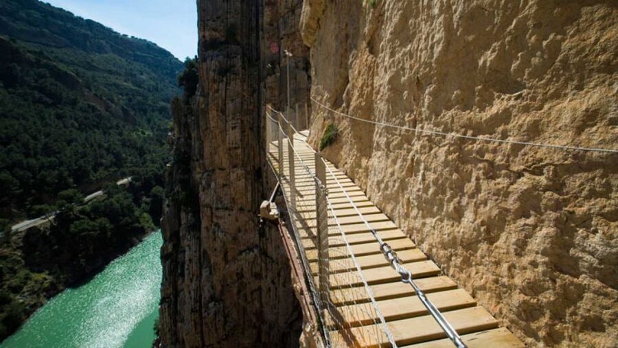 From Malaga: Caminito del Rey Private Guided Tour - Walking the Caminito: narrow boards, 100 meters down