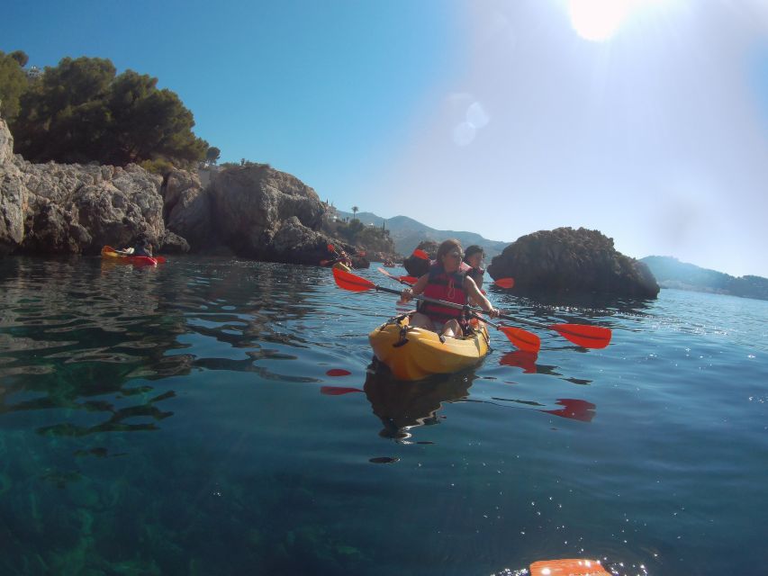 From Málaga: Cliffs of Maro-Cerro Gordo Guided Kayaking Tour - Swim stops, clear water, and marine life you can actually spot