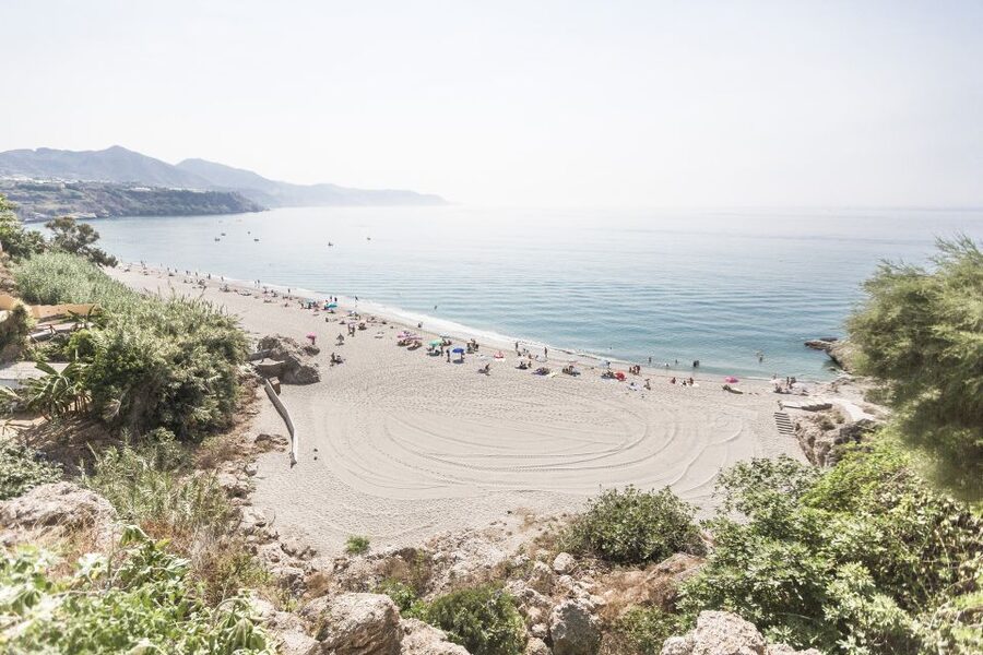From Malaga: Nerja and Frigiliana Tour - Nerja city center: narrow streets and Sierra de Almijara views