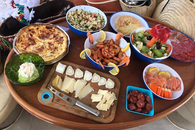 Half-Day Luxury Motor Yacht Cruise in Granada - Food, snacks, and the all-inclusive deck setup