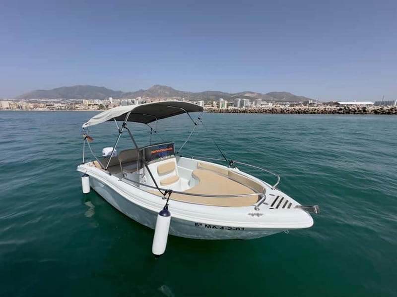 Malaga: Boat rentals without a license - Getting ready: ID, towel, sunscreen, and the deposit you should expect