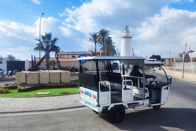 Malaga by Tuk Tuk i : 1 or 2 hours Private city tour - Malagueta Beach Stop: Urban Sand, Sea Views, Photo Time