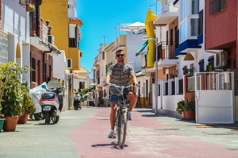 Malaga: Castle Hill and Fisherman Village E-Bike Tour - City center riding and street art, with the Pablo Picasso thread