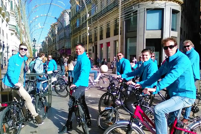 Malaga Electric Bikes Guided Tour - Seafront Riding, Alcazaba Walls, and the Port Lighthouse