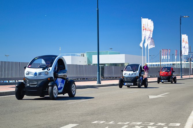 Malaga Highlights by Electric Car with Port Pick up - Climbing Toward Gibralfaro: Mansions, Viewpoints, and the Big Payoff