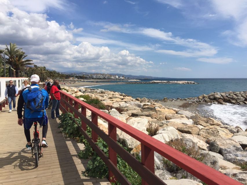 Malaga: Premium Guided Bike Tour - The beach boardwalk: Costa del Sol scenery, with real movement