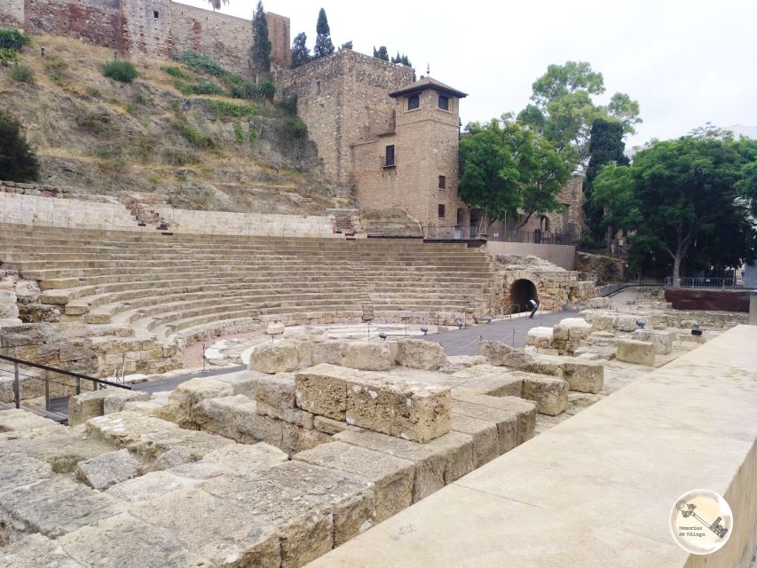 Malaga: Roman Theater and Alcazaba of Malaga Guided Tour - Finding the tour start at the Alcazaba (yellow umbrella and stairs)
