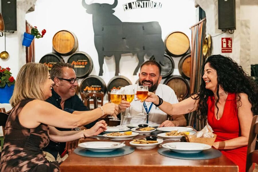 Malaga's tradition and tapas tour with Official Guide - The first tasting stop, traditional wine history at Malaga’s oldest-style tavern