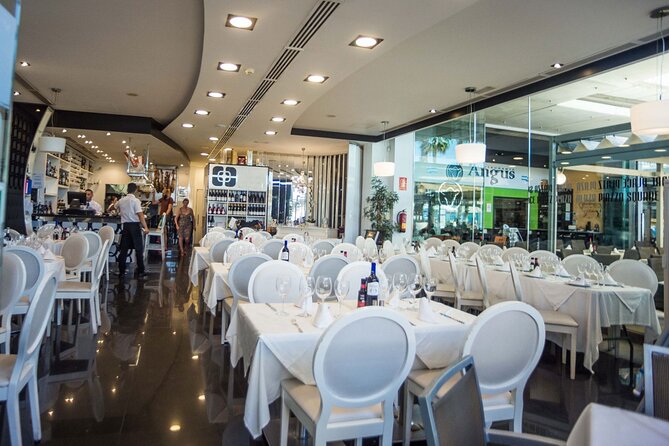 Malaga Sunset Cruise and Restaurant Dinner - Stepping off the boat and walking to Lounge Bar Plaza