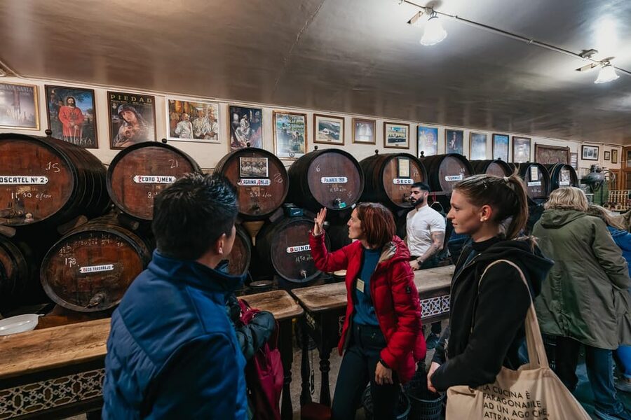 Málaga: Traditional Andalusian Tapas and Wine Tour - Lunch-style stop at a long-running local restaurant