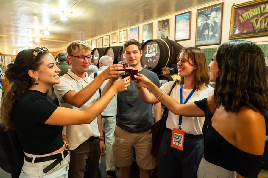 Malaga: Wine and Tapas Tour with Tastings and Drinks - The winery stop: Malaga sweet wine and the oldest Malaguena canteen feel