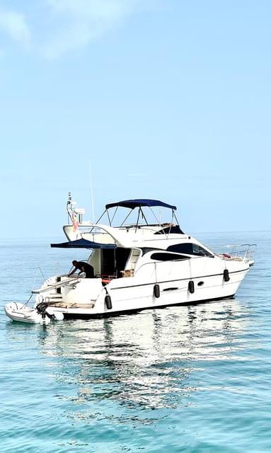 Marbella: Private Cruise in Yacht - Paddle Surfing, Snorkel, and a Real Swim Break