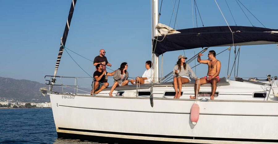 Marbella: Sailing & Dolphin Watching with Snacks and Drinks - Onboard vibe: drinks, snacks, and music without the fuss