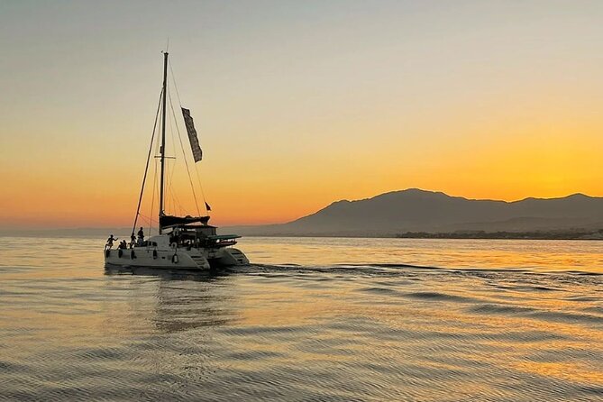 Marbella Small Group Catamaran with Dolphin Watching - The anchor time: swim, snorkel, paddle surf, and fishing