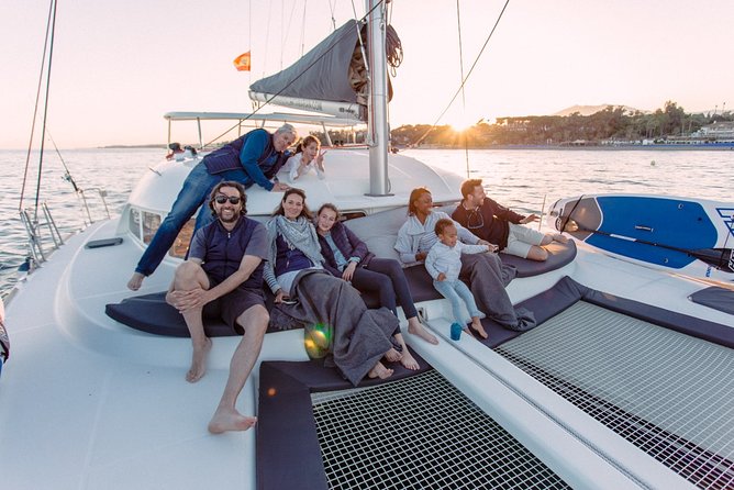 Marbella Small Group Catamaran with Dolphin Watching - Drinks, music, and the feel-good return ride