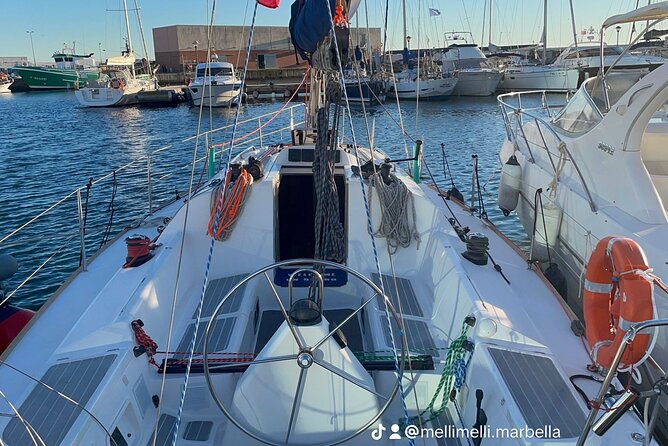 Marbella- sunset from a sailboat with drinks - The Puerto Banus marina moment: why it matters even before sunset