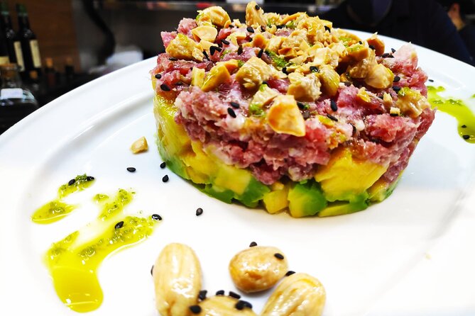 PREMIUM TAPAS TOUR: Paella, Market Tastings, and Winery - Mercado Central de Atarazanas: where the tastings start making sense