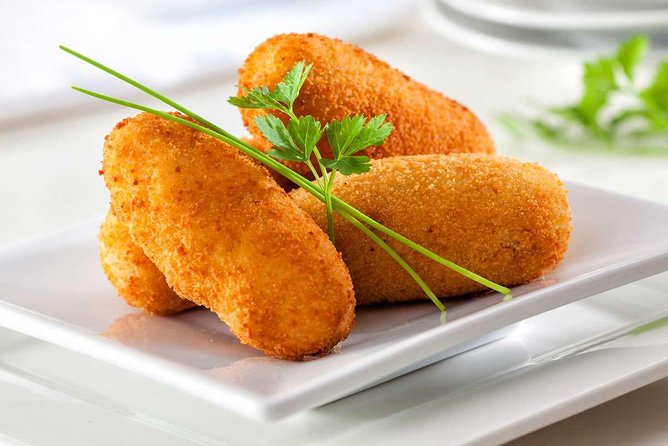 PREMIUM TAPAS TOUR: Tapas, Paella and Winery - Plaza del Siglo and the Fish Specialty Show Cooking
