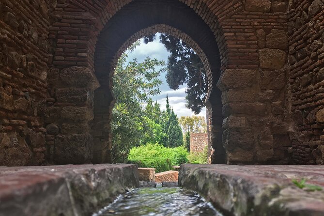 Roman Theatre and Alcazaba of Málaga Tour - Arabic gardens, palace rooms, and the Port of Málaga view