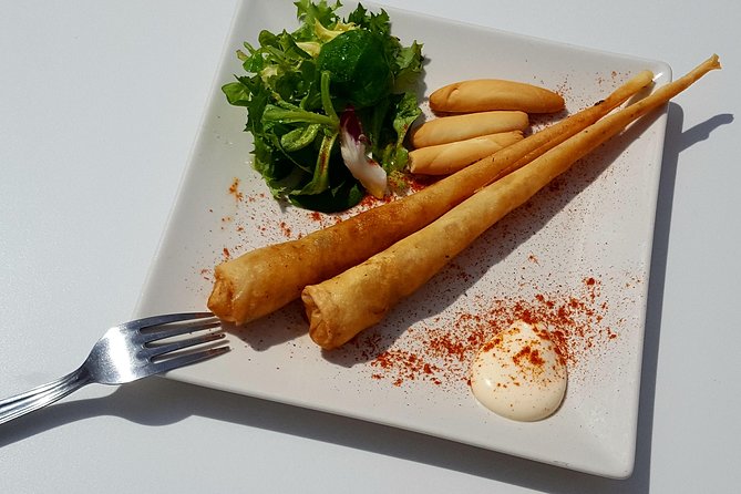 Wine, Tapas & Lake Zahara by e-bike incl Ronda pickup (full day) - Wine, tapas, and lunch that keeps the day moving